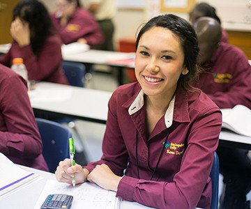 San Joaquin Valley College Student learning the fundamental skills in a business administration program