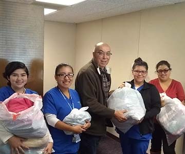 SJVC Delano students participate in holiday clothes donation