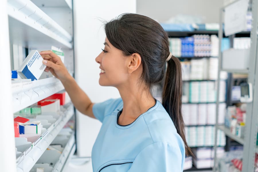 pharmacy technician at shelf