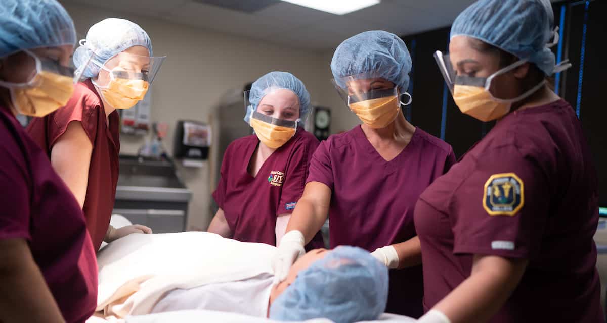 Students in Scrubs In an Operating Room