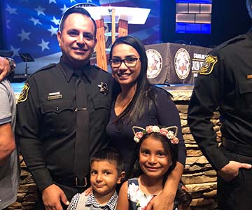 SJVC Modesto Corrections graduate Santiago Orozco with his family
