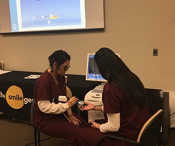 temecula-dental-assisting-students-training-on-cad-cam-machine